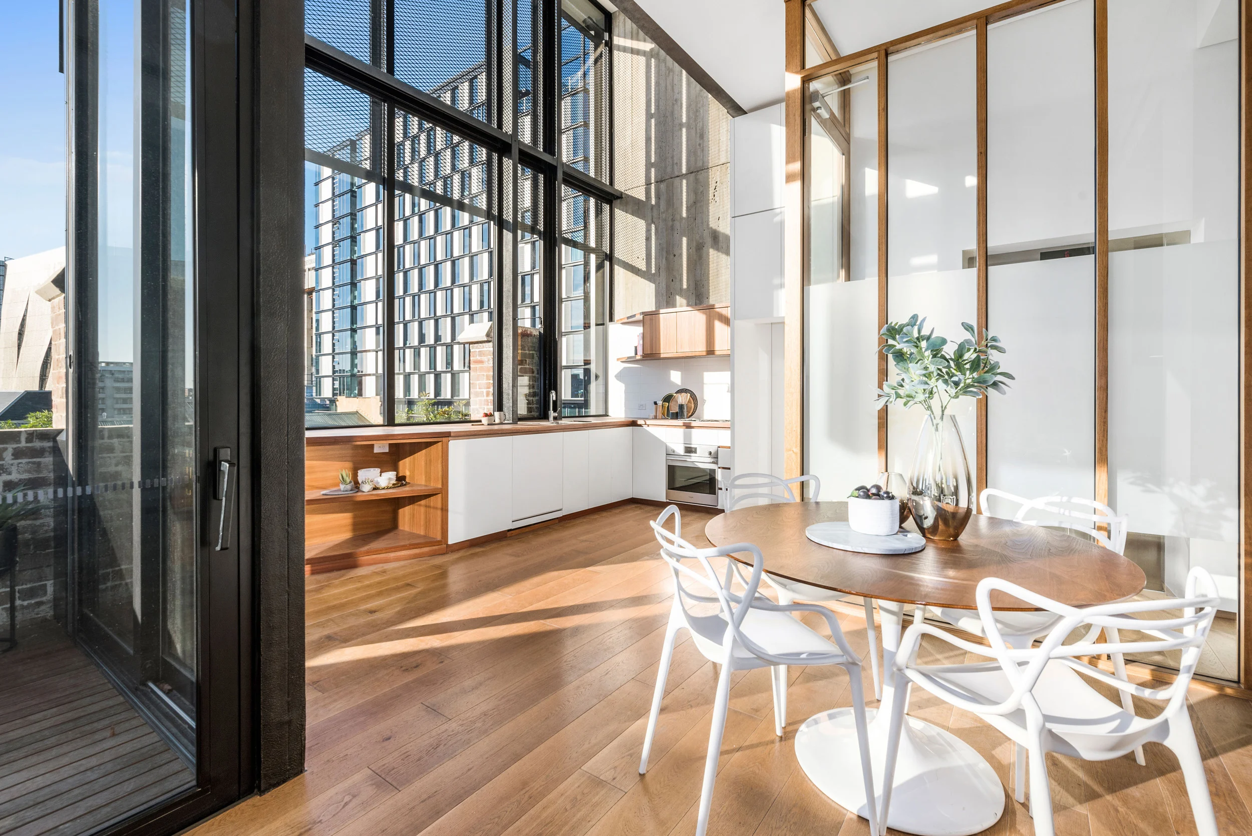 Kitchen and dining room of a property in Chippendale, Sydney designed by Ballina architects Markham Lee.