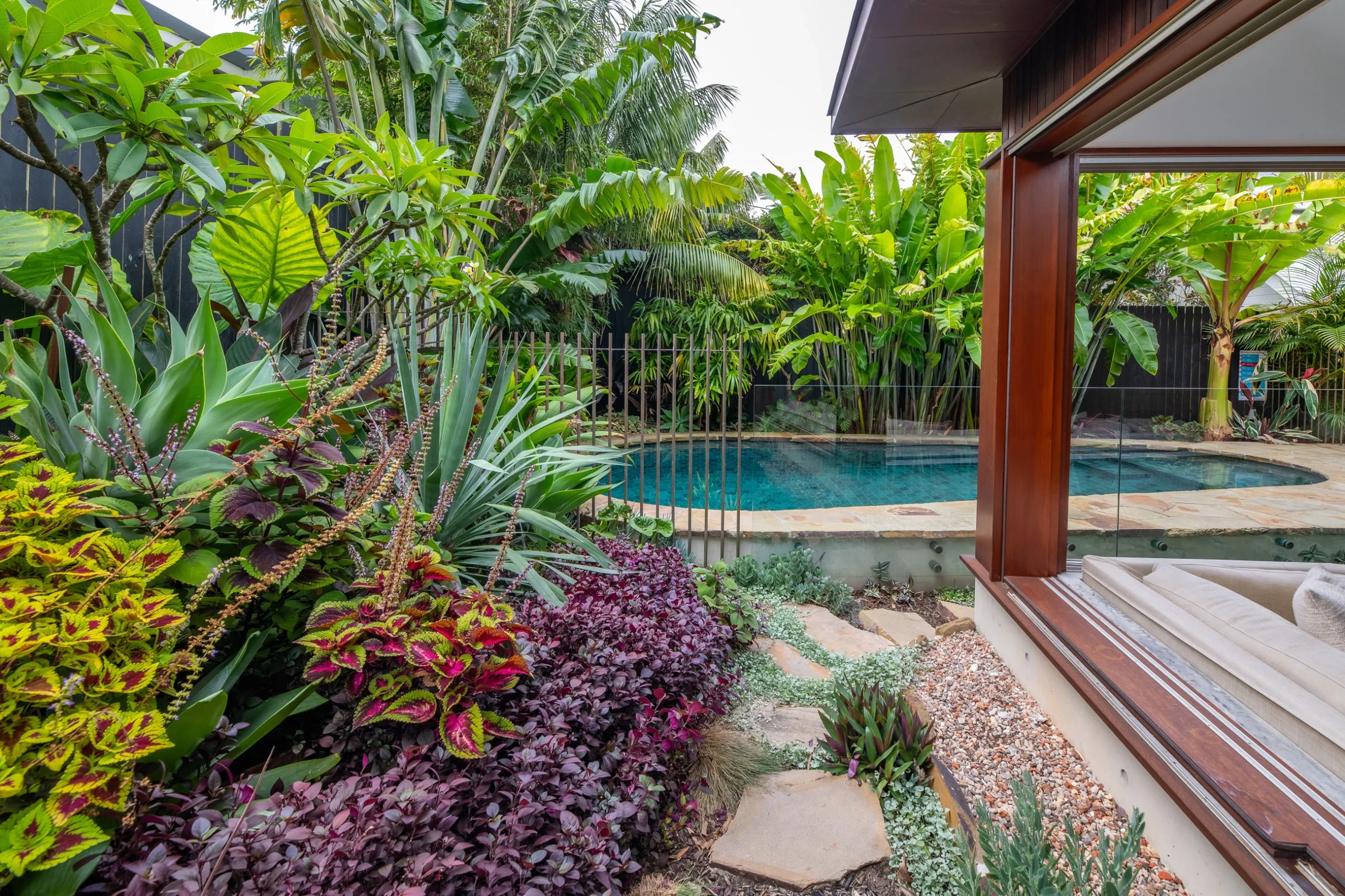 Pool and garden of a property in Avalon Beach, Sydney designed by Northern Rivers architects Markham Lee.