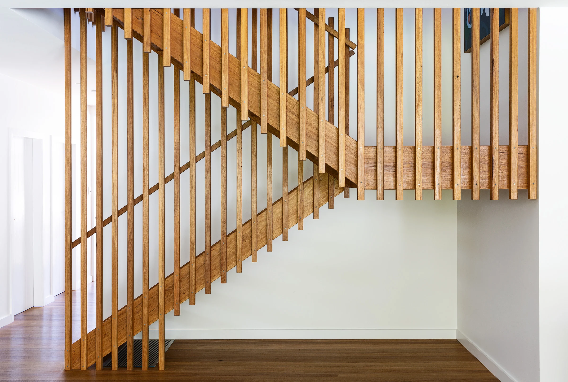 Staircase of a property in Avalon Beach, Sydney designed by Byron Bay architects Markham Lee.